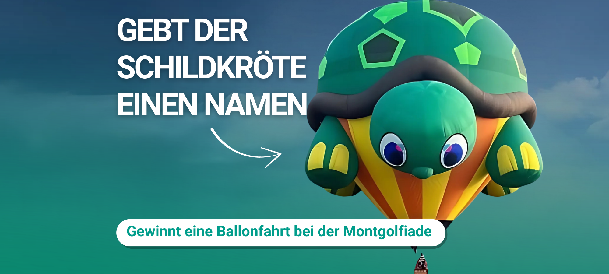 Ein großer Heißluftballon in Form einer Schildkröte ist am Himmel zu sehen dazu der Text: Euer name für die Special-Shape - Gewinnte iene Ballonfahrt bei der Montgolfiade"